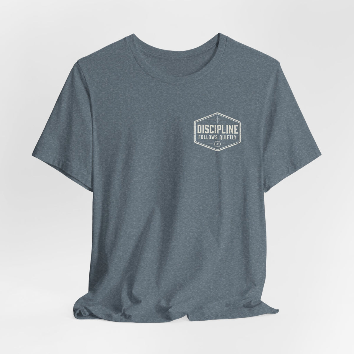"Discipline Follows Quietly" Motivational Badge Graphic Tee