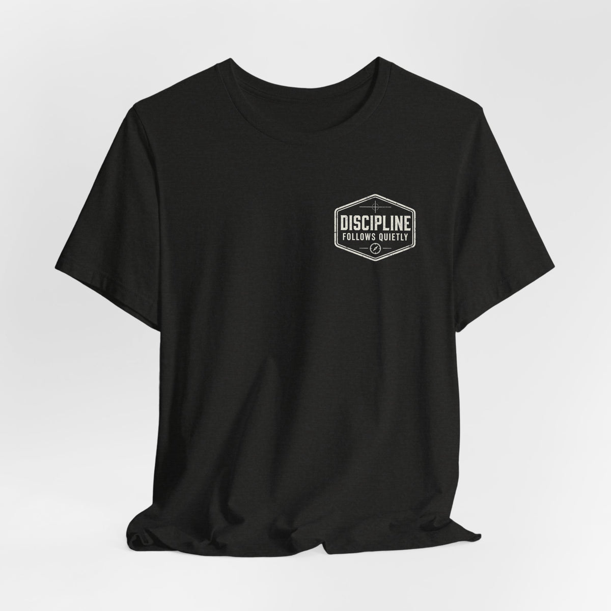 "Discipline Follows Quietly" Motivational Badge Graphic Tee